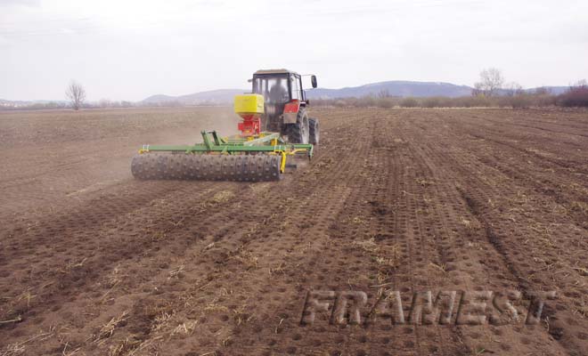 M3100 trailed combinator with mounted water manager rubber roll and pneumatic seeder unit
